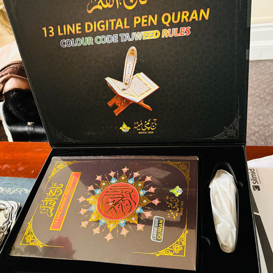 13 Line Digital Pen Quran packaging with visible text and design elements.