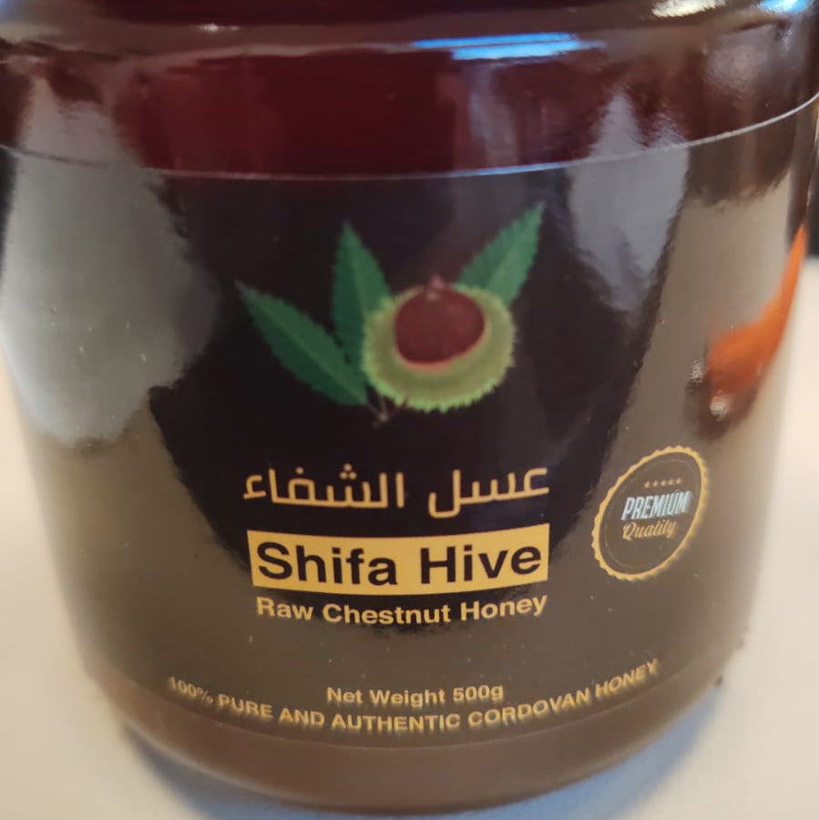 Jar of Shifa Hive raw chestnut honey on a white background